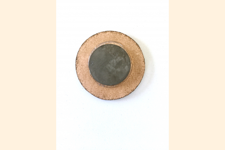 Back of Magnet Shows Leather Circle with Magnet