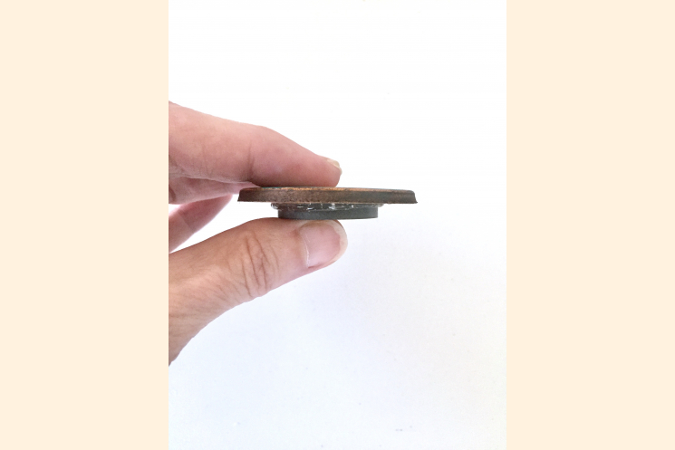 Magnet Thickness Shown Between Thumb and First Finger