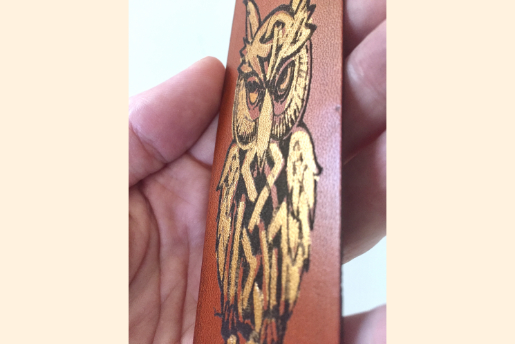 Celtic Owl Bookmark Held With Hand to Show Scale Detail