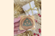 Green Triquetra Magnet in packaging with Holiday Background